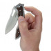 Canivete CRKT Fossil com sistema IKBS e empunhadura em G10. 
